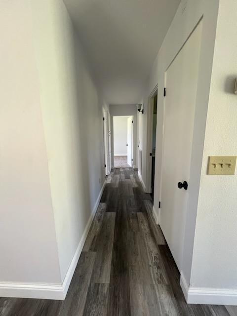 18690 Reeds Creek Road Red Bluff, CA 96080 - Photo 17 of 23 a view of a hallway with wooden floor and staircase