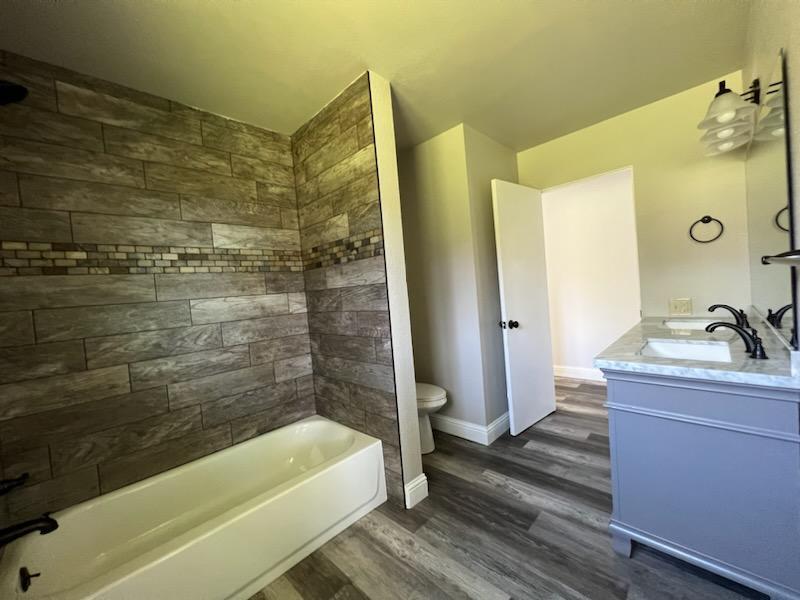 18690 Reeds Creek Road Red Bluff, CA 96080 - Photo 18 of 23 a bathroom with a bathtub and shower