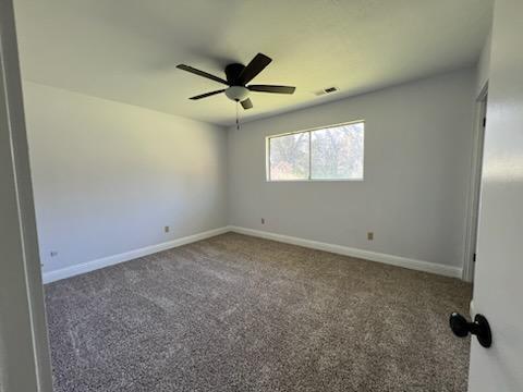 18690 Reeds Creek Road Red Bluff, CA 96080 - Photo 20 of 23 an empty room with a window and a fan