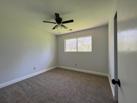 18690 Reeds Creek Road Red Bluff, CA 96080 - Photo 22 of 23 a view of room with window and ceiling fan