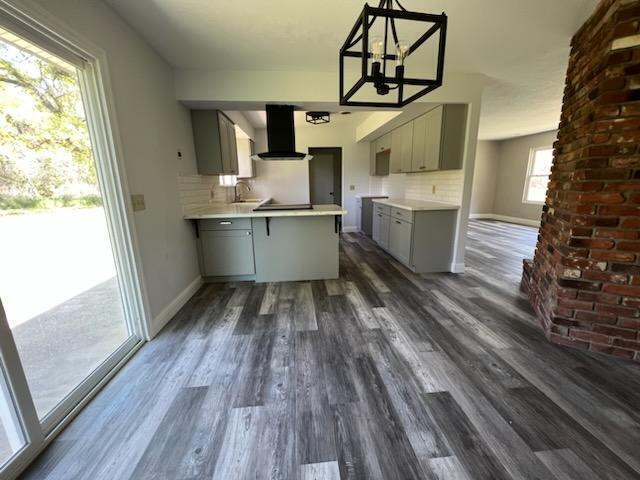 18690 Reeds Creek Road Red Bluff, CA 96080 - Photo 9 of 23 a kitchen with a sink and wooden floor