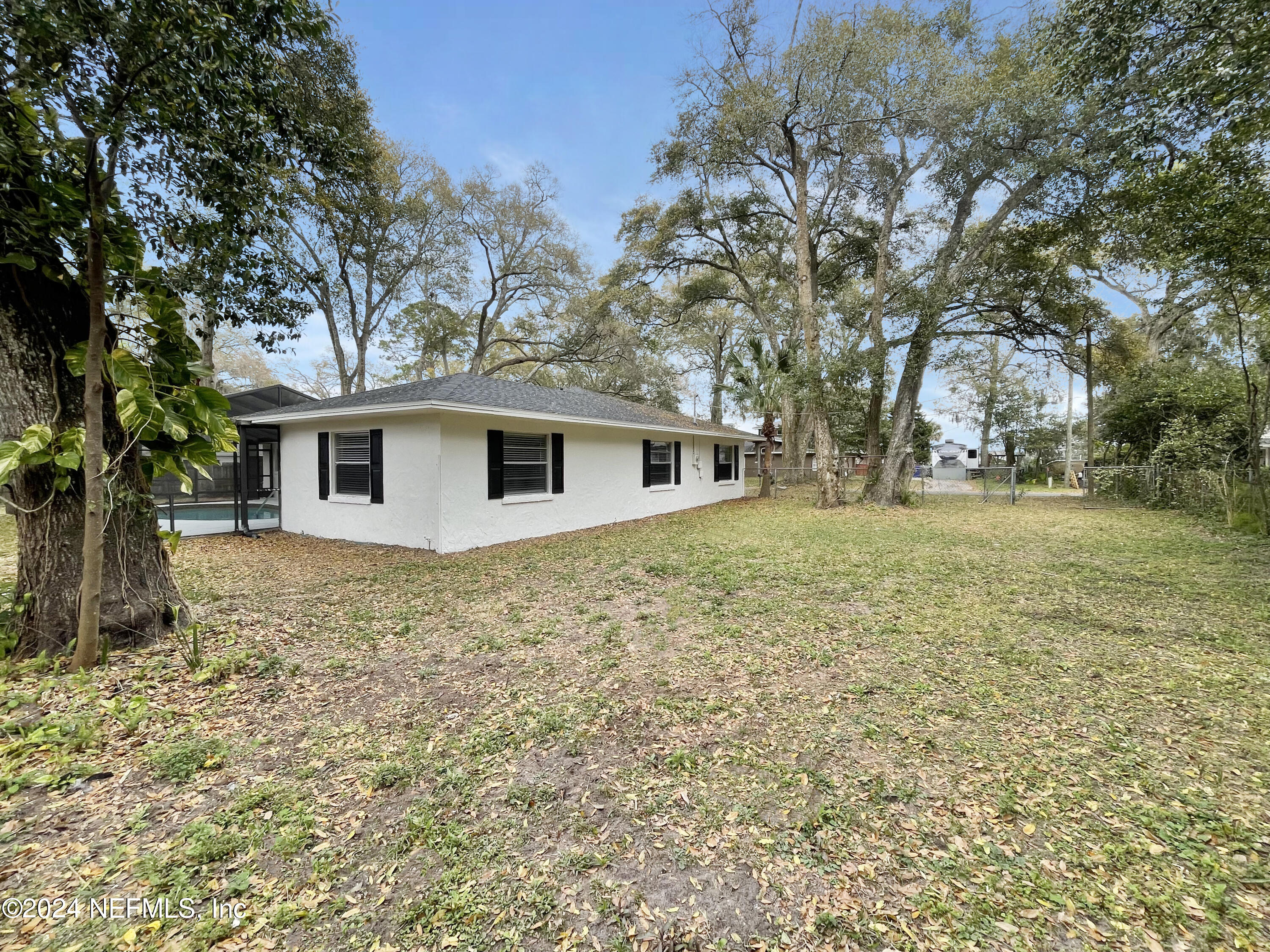 830 Gerona Road St. Augustine, FL 32086 - Photo 25 of 27 a view of a house with a yard