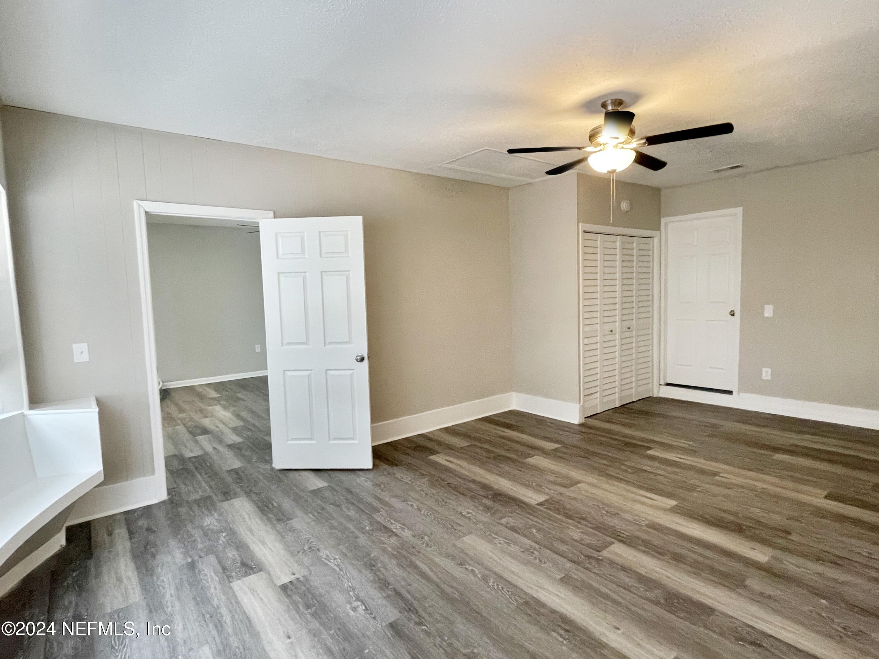 830 Gerona Road St. Augustine, FL 32086 - Photo 6 of 27 a view of empty room with wooden floor