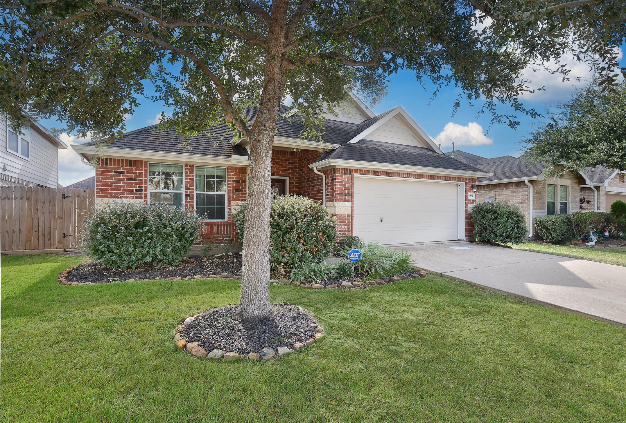 1279 Pinto Pass Alvin, TX 77511 - Photo 1 of 31 a front view of house with yard and green space