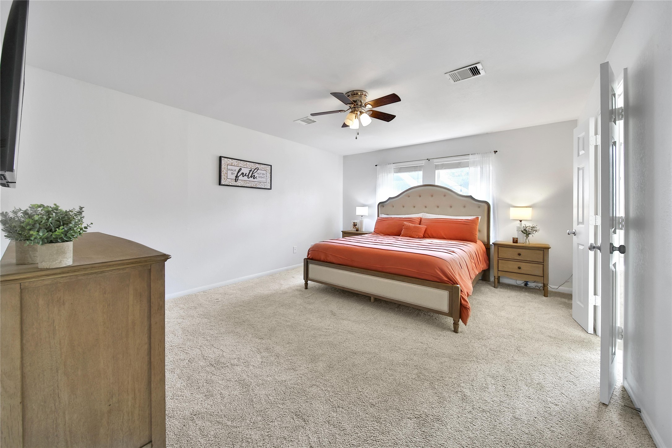 1279 Pinto Pass Alvin, TX 77511 - Photo 15 of 31 a bedroom with a bed and a potted plant