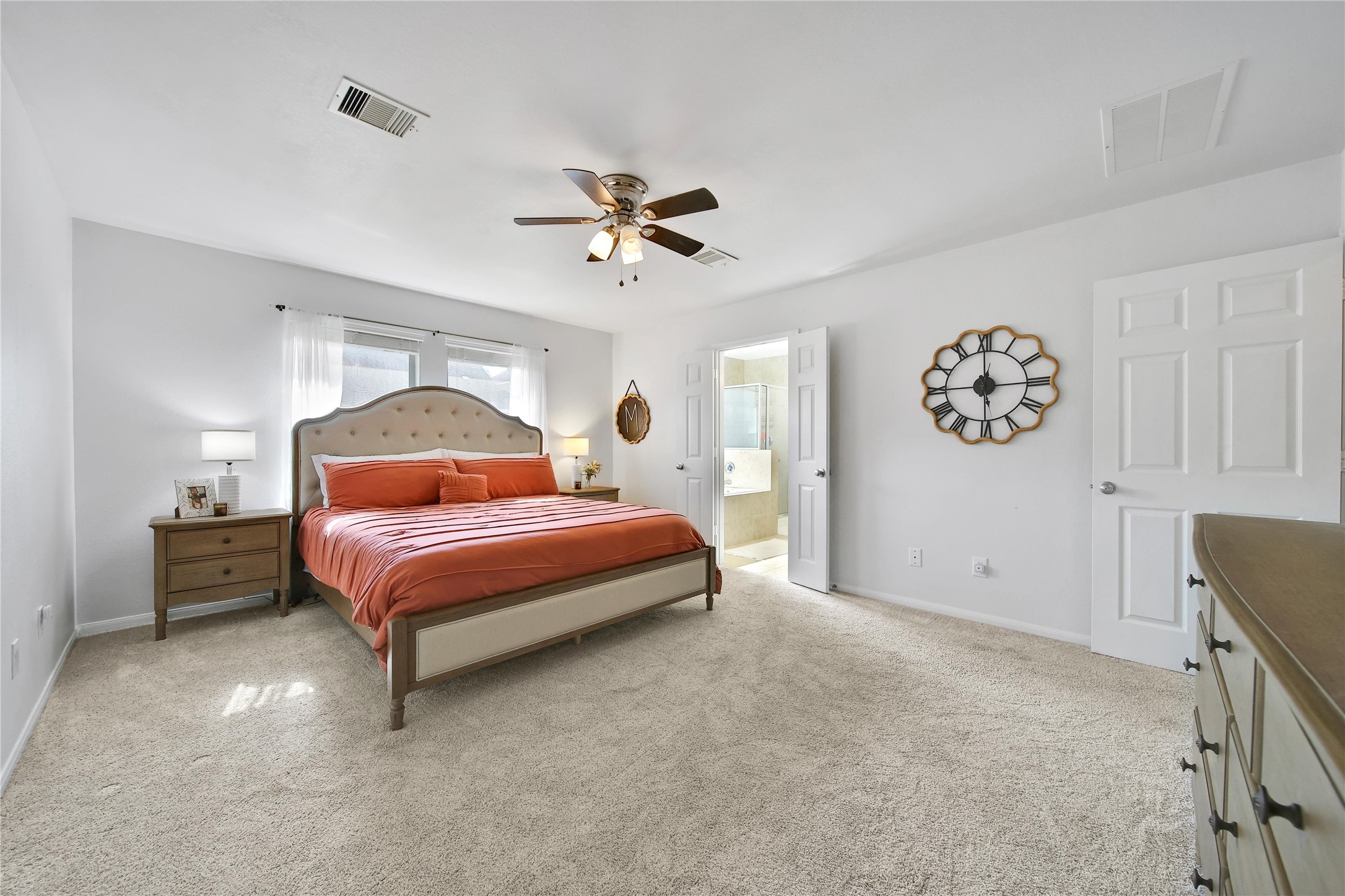 1279 Pinto Pass Alvin, TX 77511 - Photo 16 of 31 a bedroom with a bed and a chandelier