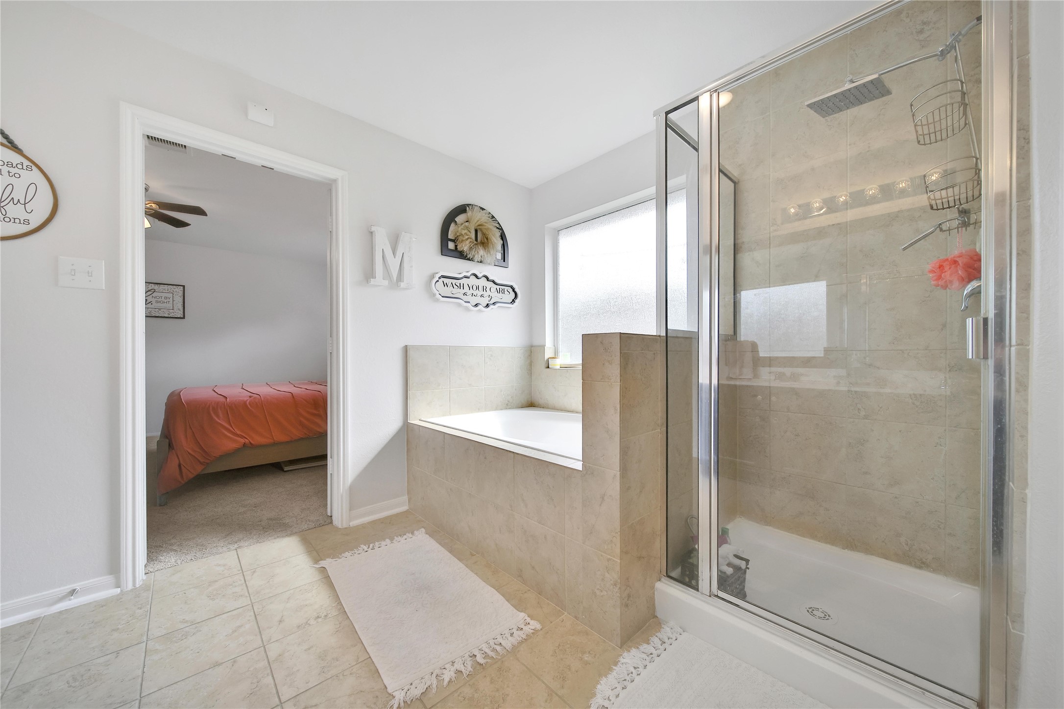 1279 Pinto Pass Alvin, TX 77511 - Photo 20 of 31 a en suite bathroom with a tub and shower