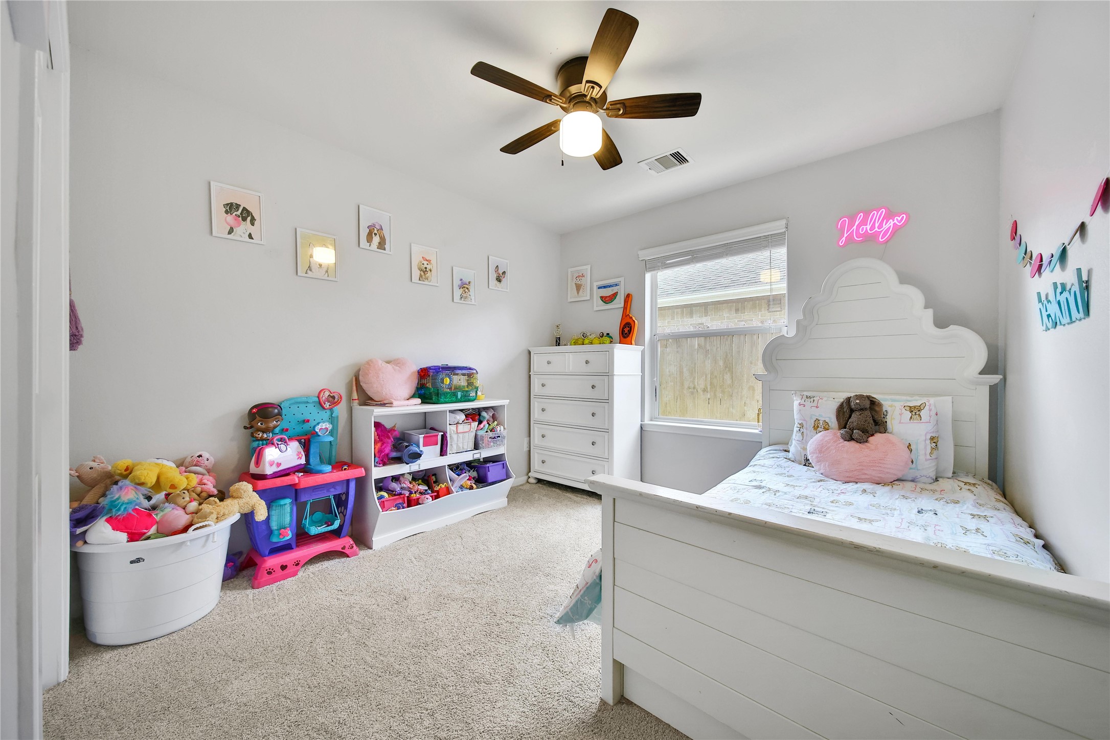 1279 Pinto Pass Alvin, TX 77511 - Photo 23 of 31 a bedroom with furniture and a chandelier fan