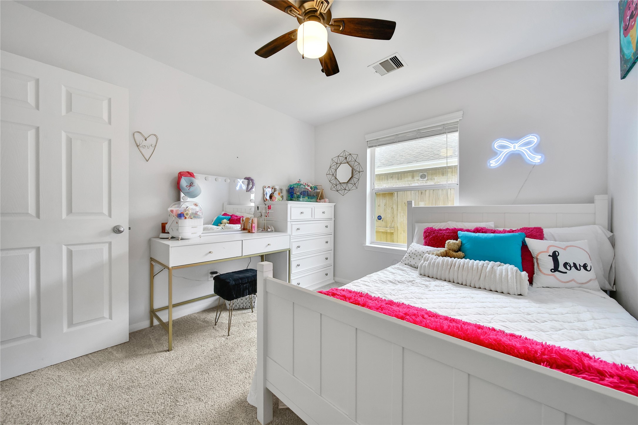 1279 Pinto Pass Alvin, TX 77511 - Photo 24 of 31 a bedroom with a bed and a dresser