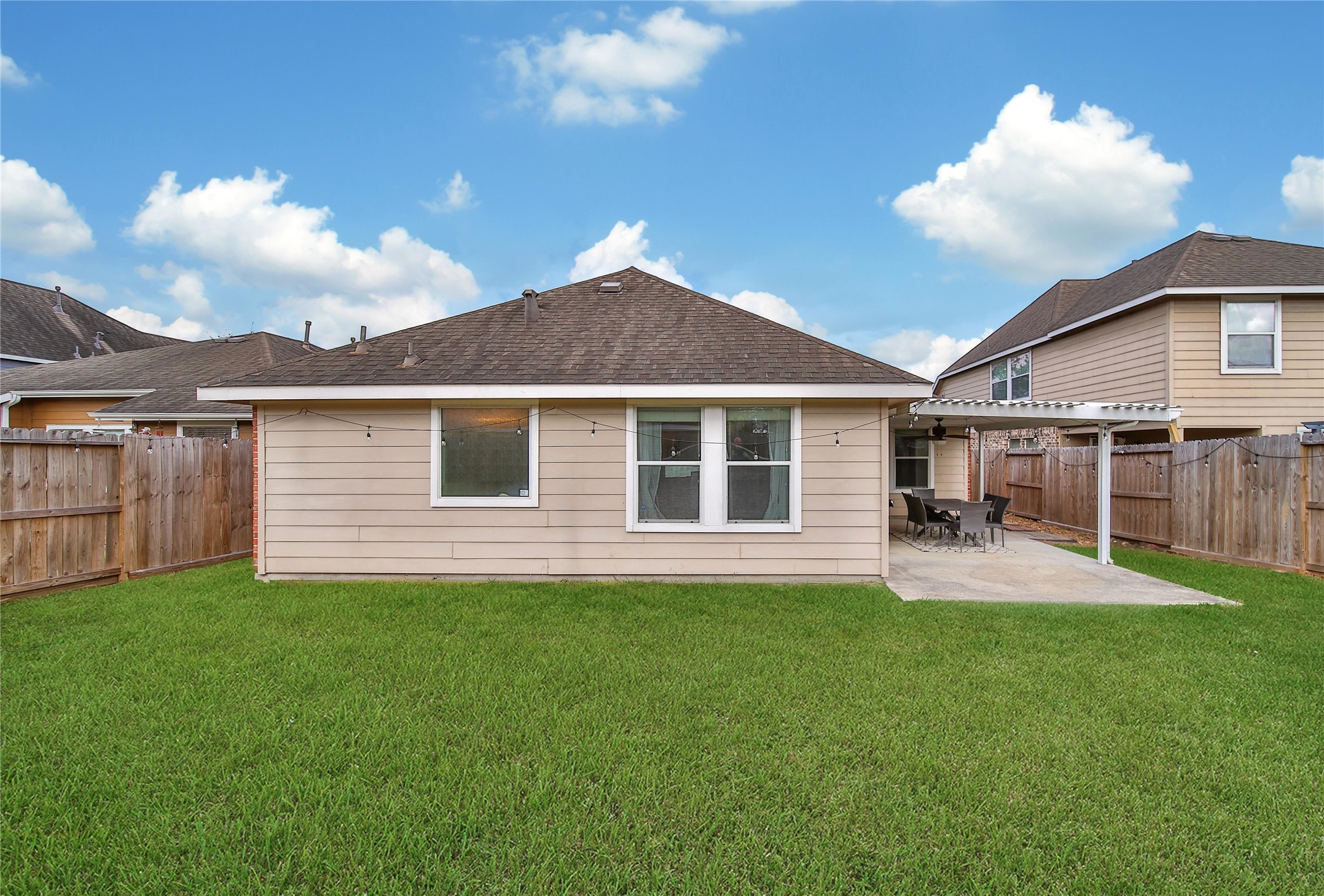 1279 Pinto Pass Alvin, TX 77511 - Photo 29 of 31 a house view with a sitting space and garden