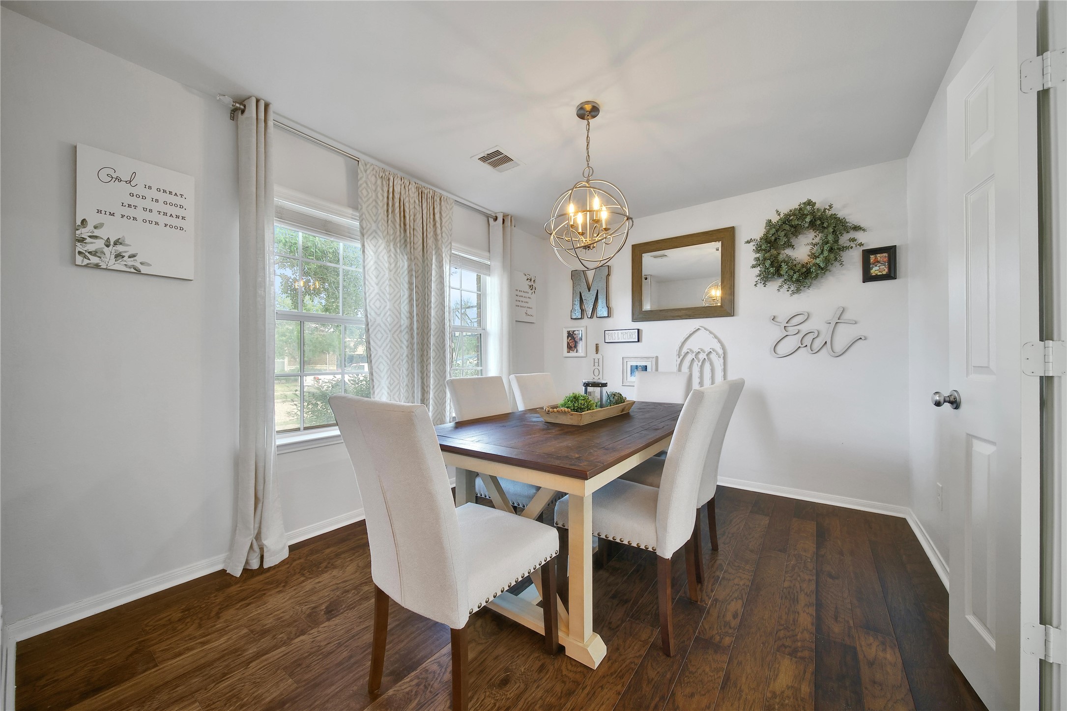 1279 Pinto Pass Alvin, TX 77511 - Photo 6 of 31 a view of a dining room with furniture and wooden floor