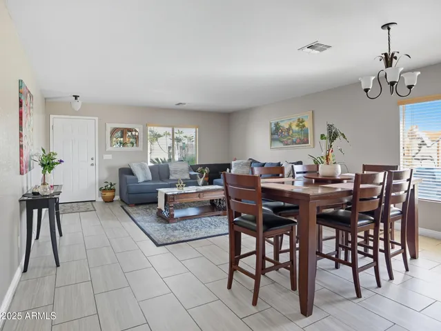 a view of a dining room with furniture