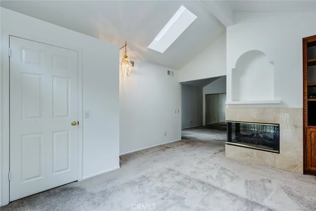 a view of a livingroom with a fireplace