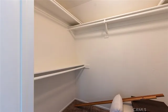 a view of small space with racks on the wall