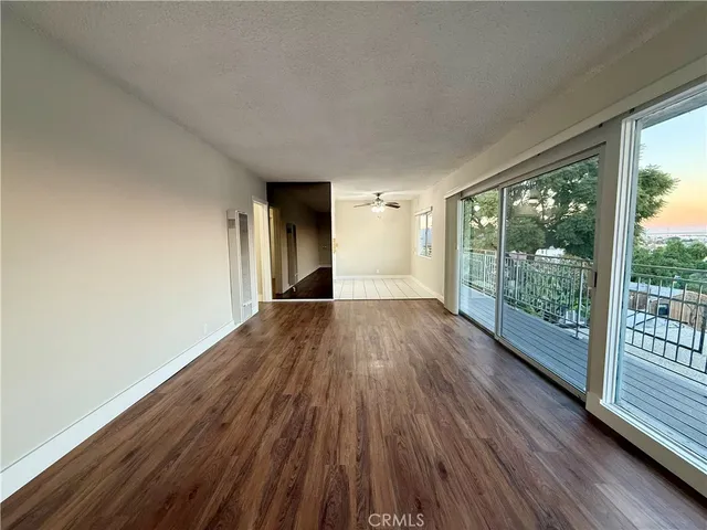 a kitchen with stainless steel appliances a refrigerator sink and cabinets