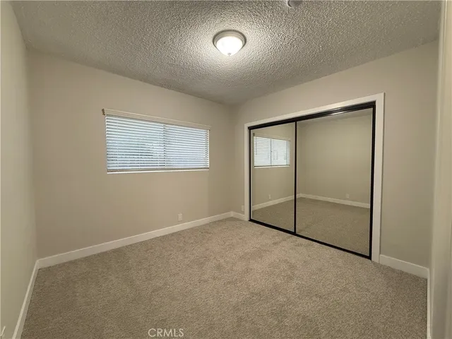 a bathroom with a sink a vanity and mirror