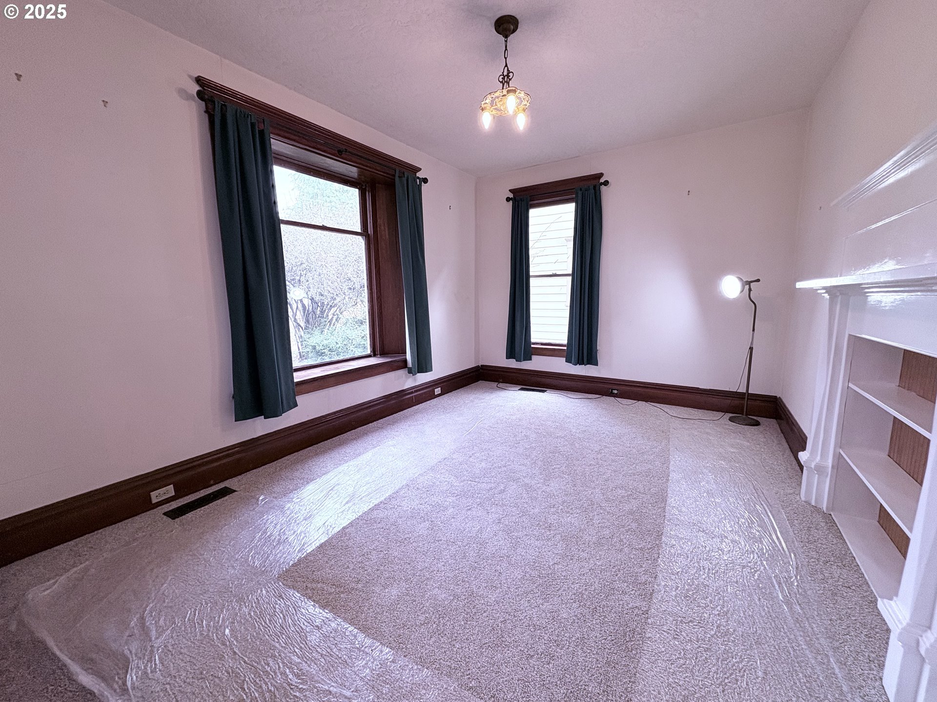 430 West Water Street Stayton, OR 97383 - Photo 18 of 42 a view of an empty room with a window