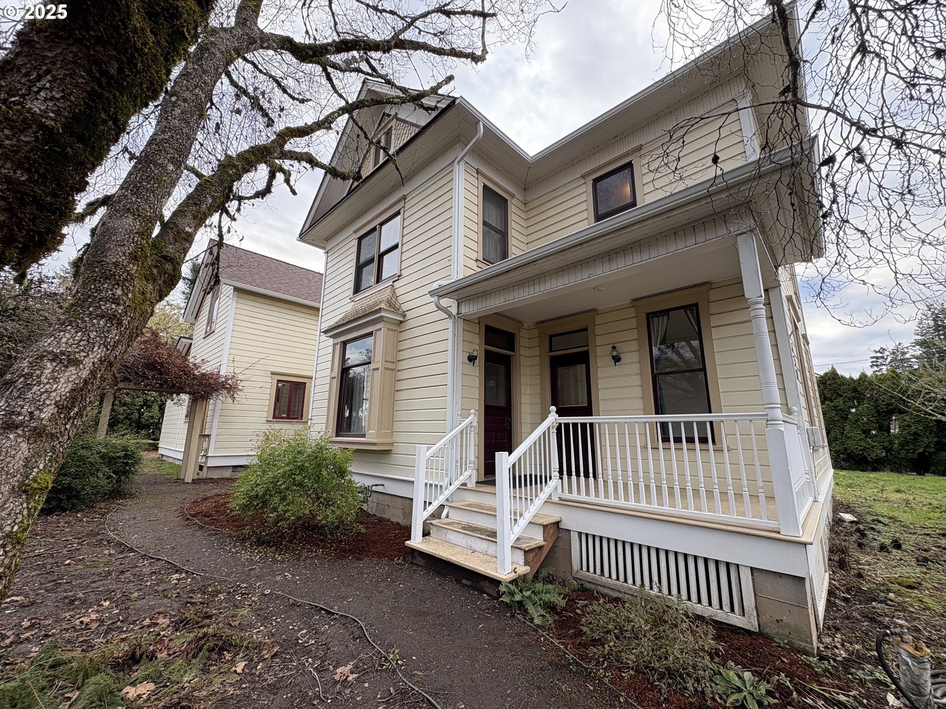 430 West Water Street Stayton, OR 97383 - Photo 2 of 42 a view of a house with a yard