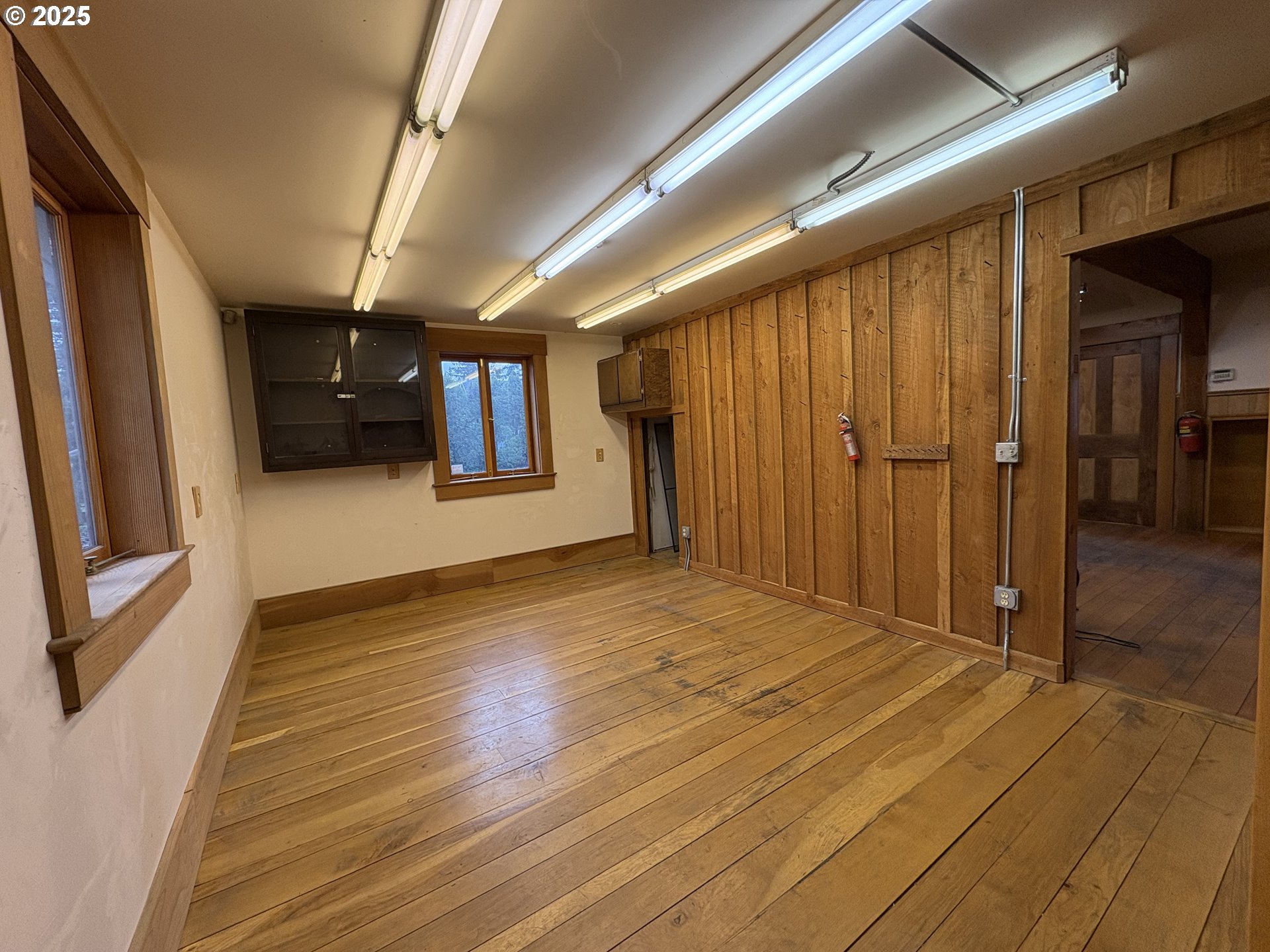 430 West Water Street Stayton, OR 97383 - Photo 34 of 42 a view of a hallway with wooden floor