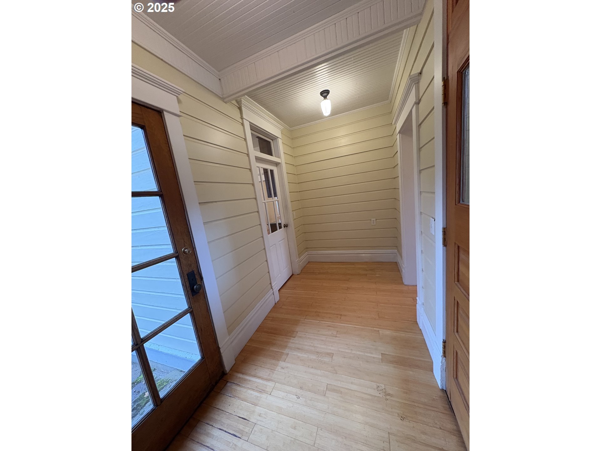 430 West Water Street Stayton, OR 97383 - Photo 10 of 42 a view of a hallway with wooden floor