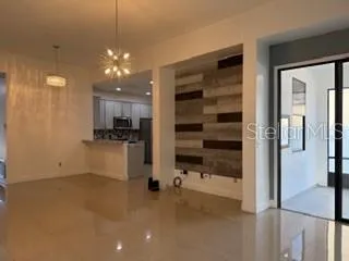 a view of a kitchen with a sink and cabinets