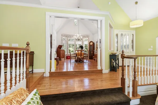 a bedroom with a bed and flat screen tv
