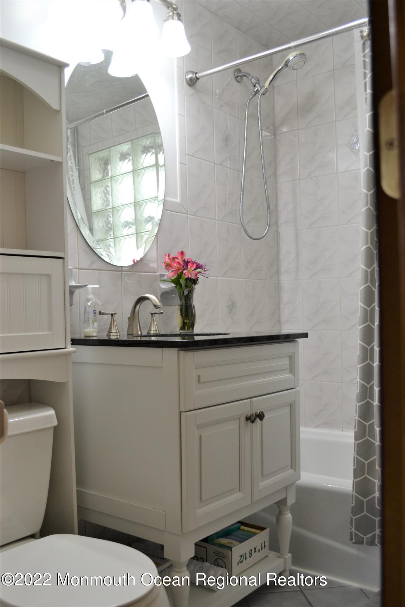 319 Boulevard Kenilworth, NJ 07033 - Photo 17 of 40 2nd floor bathroom fully tiled