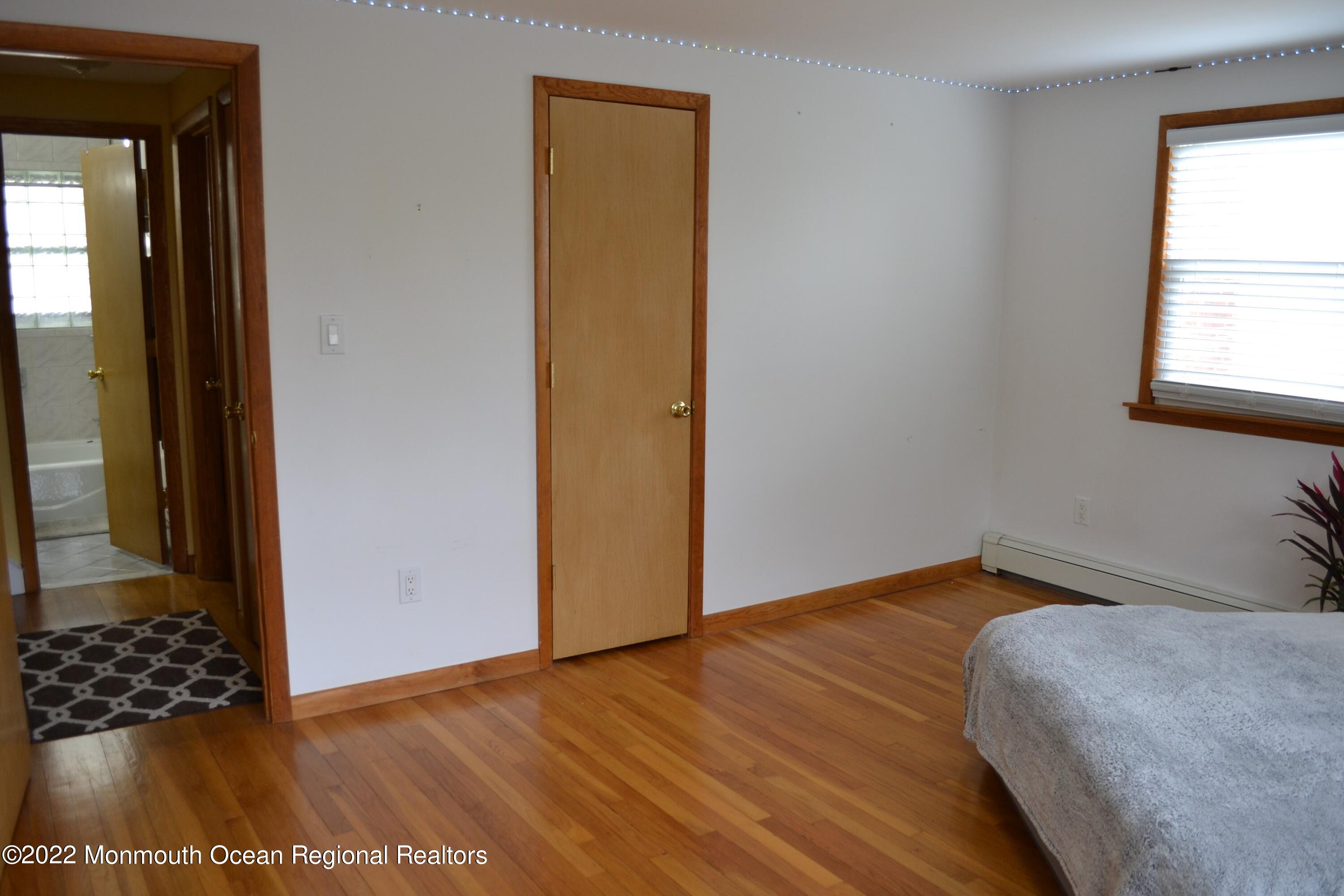 319 Boulevard Kenilworth, NJ 07033 - Photo 19 of 40 2nd floor bedroom beautiful floors