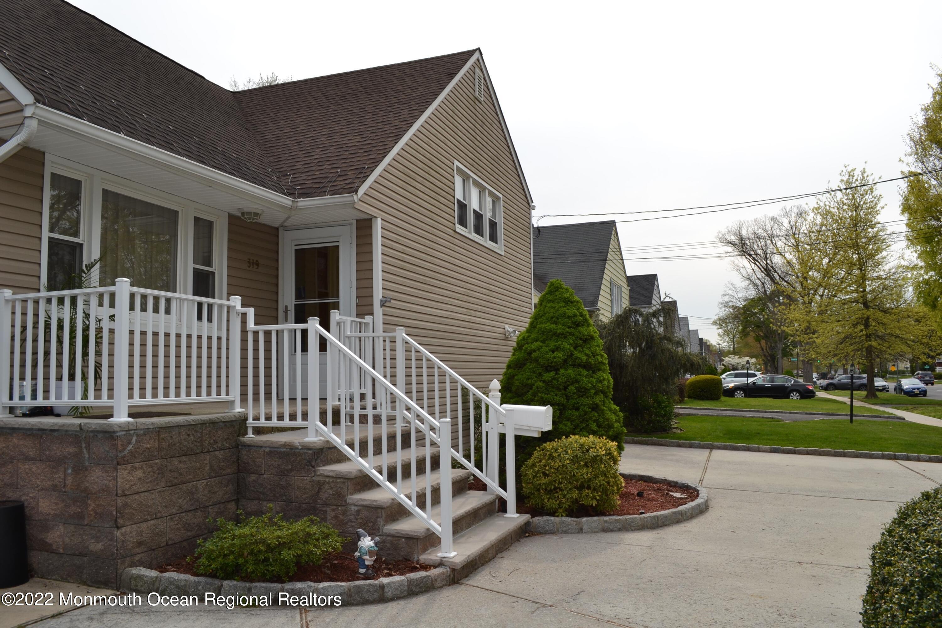 319 Boulevard Kenilworth, NJ 07033 - Photo 2 of 40 double wide concrete driveway and walk