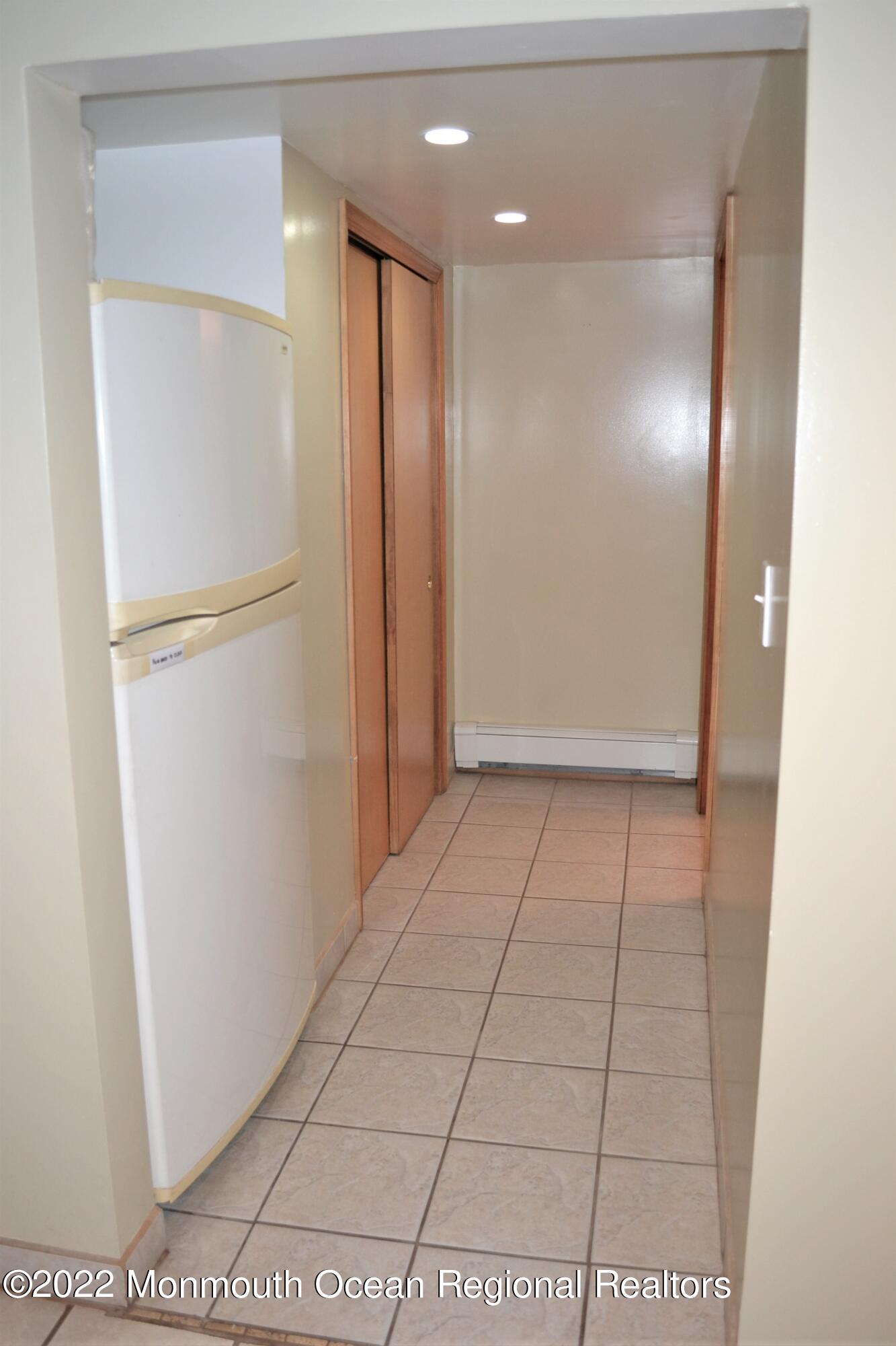 319 Boulevard Kenilworth, NJ 07033 - Photo 30 of 40 basement hall to bathroom with closet