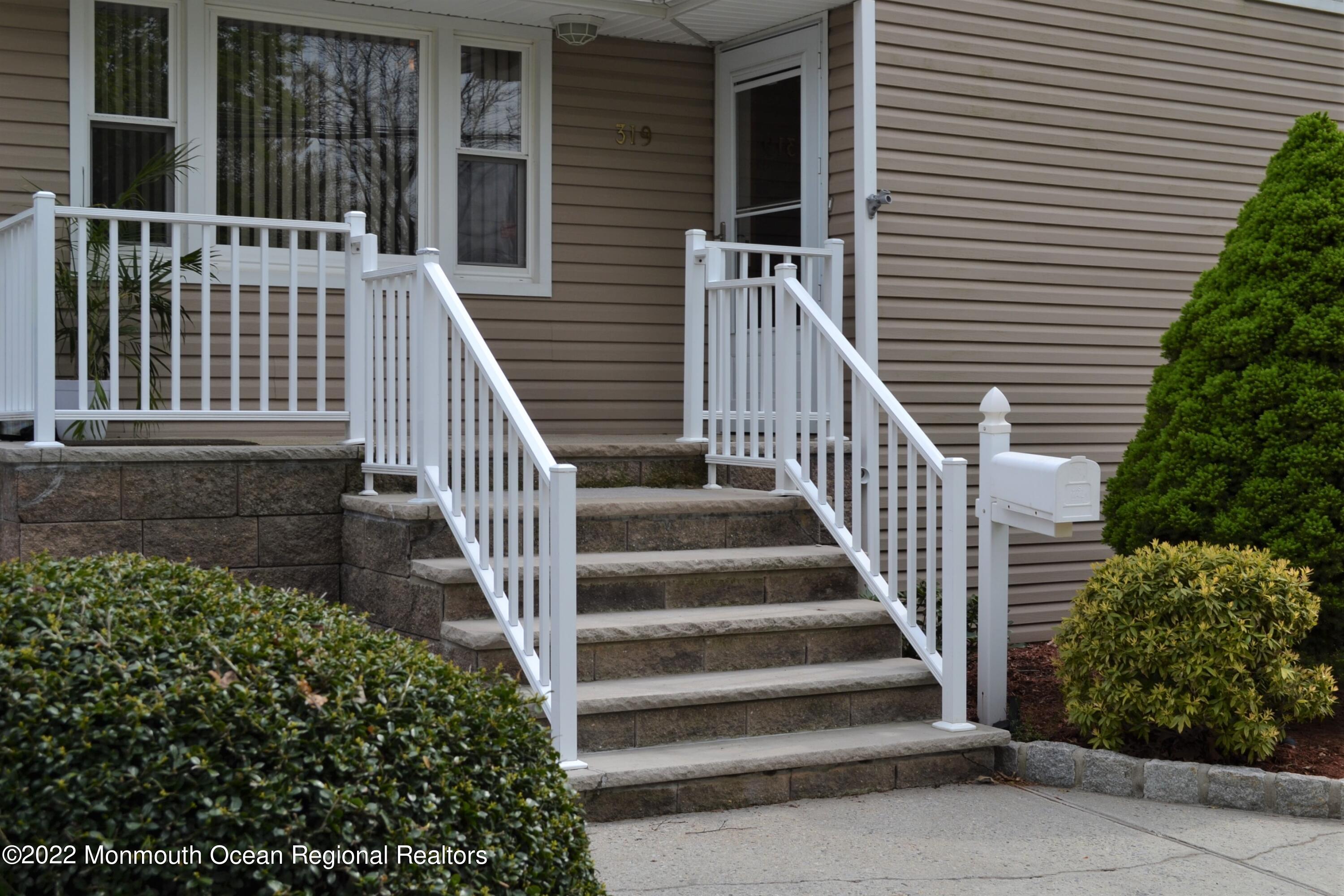 319 Boulevard Kenilworth, NJ 07033 - Photo 38 of 40 rocking chair front porch