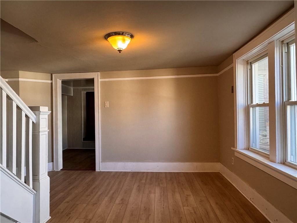 528 3rd Street Charleroi, PA 15022 - Photo 37 of 50 a view of empty room with wooden floor and fan