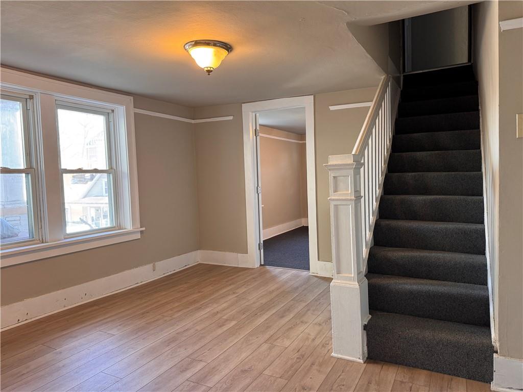 528 3rd Street Charleroi, PA 15022 - Photo 38 of 50 wooden floor in an empty room with a window and wooden floor