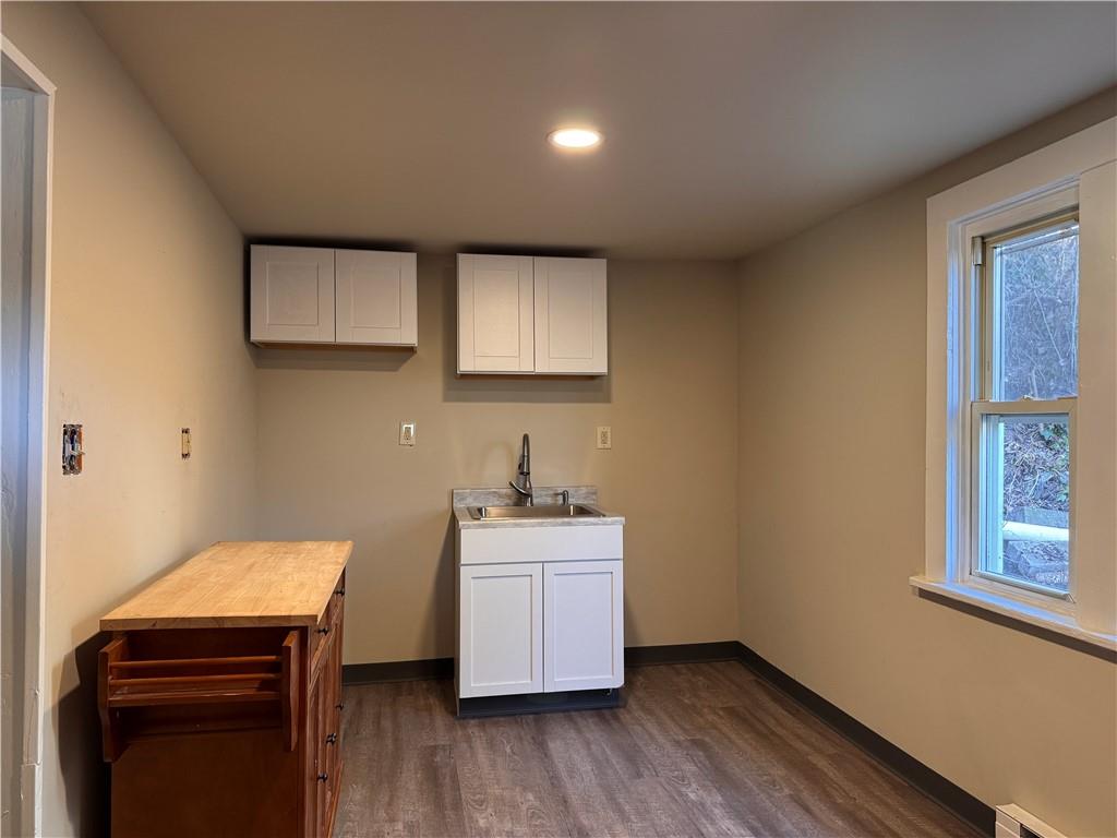 528 3rd Street Charleroi, PA 15022 - Photo 43 of 50 a room with a sink and cabinets