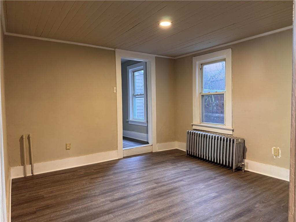 528 3rd Street Charleroi, PA 15022 - Photo 45 of 50 an empty room with wooden floor and windows