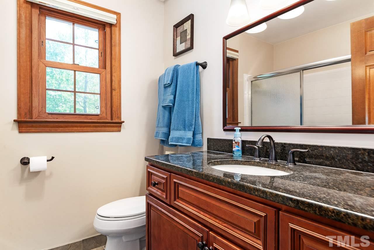 3005 Daventry Lane Raleigh, NC 27613 - Photo 24 of 30 Lovely secondary bath with granite counter.