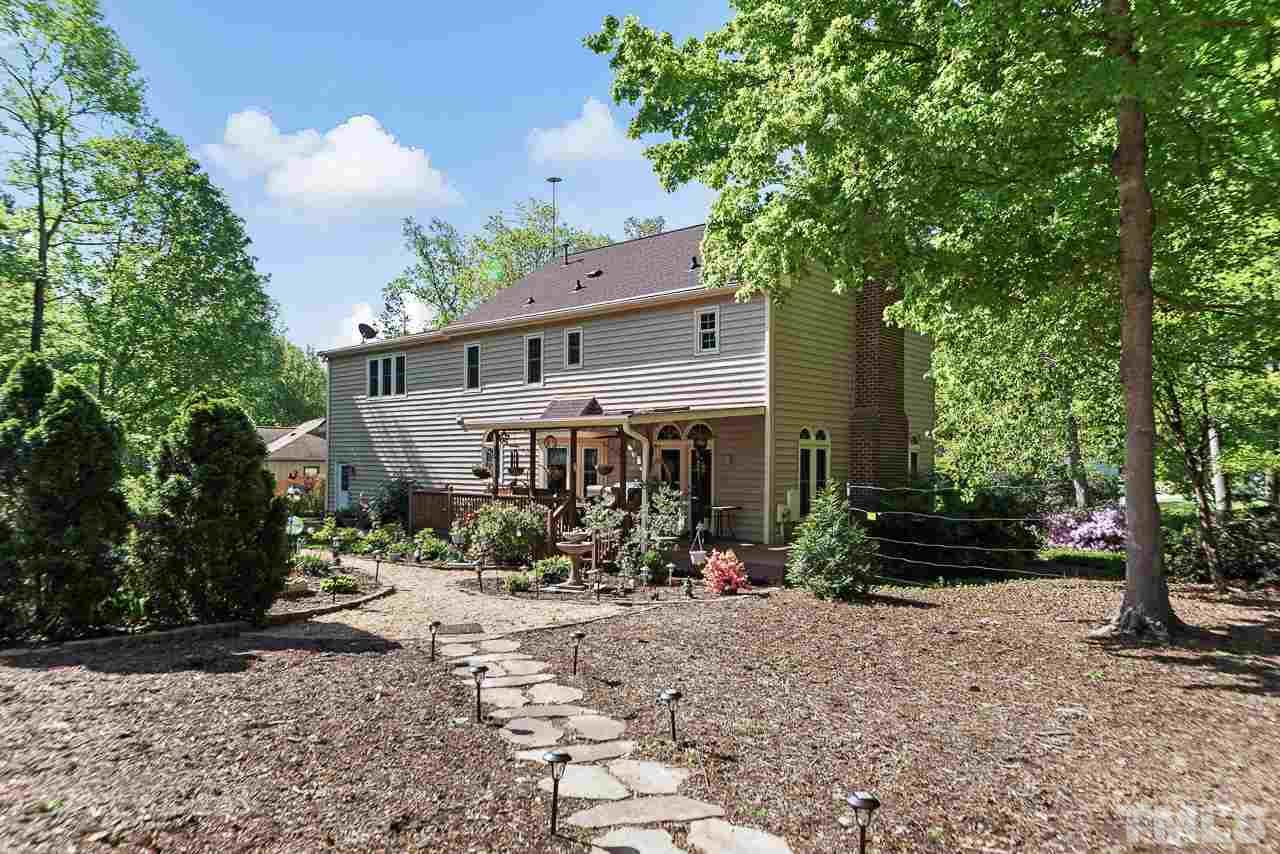 3005 Daventry Lane Raleigh, NC 27613 - Photo 25 of 30 Lovely yard with raised beds, gardens, workshop/shed made more. Everything to make this perfect for the outdoor lover and gardener.
