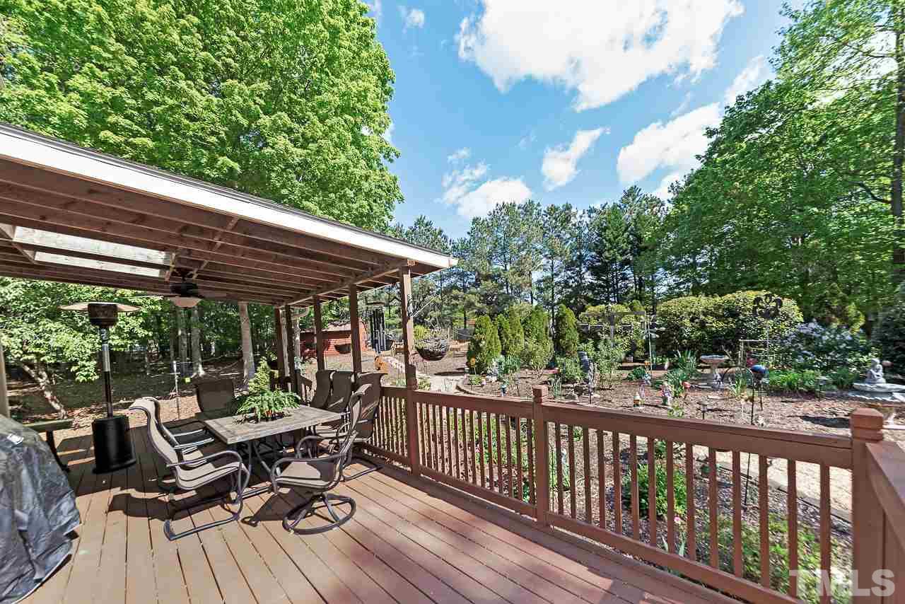 3005 Daventry Lane Raleigh, NC 27613 - Photo 26 of 30 Sit outside under your covered patio and take in the birds, quiet and private back yard.