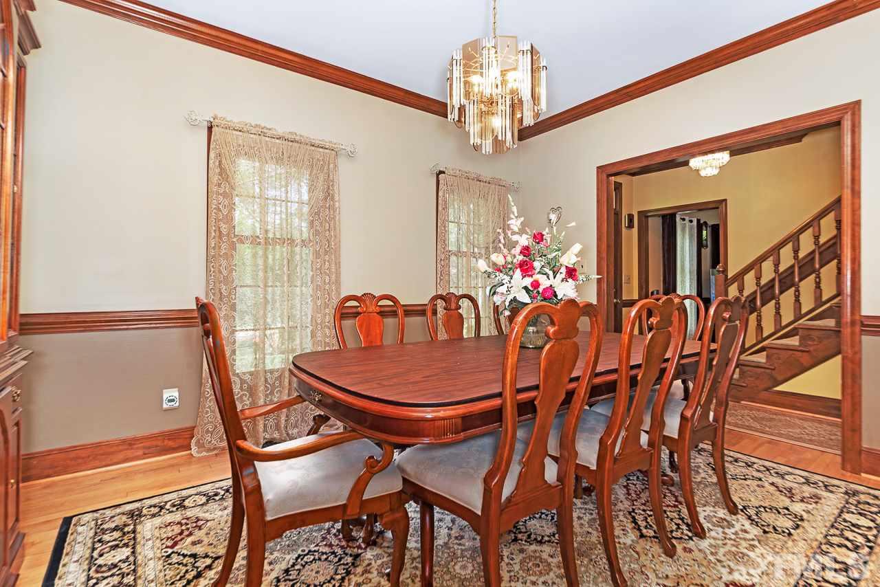 3005 Daventry Lane Raleigh, NC 27613 - Photo 10 of 30 Hardwoods grace the whole first floor. Bright separate dining room perfect for entertaining.