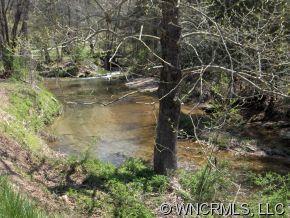 2185 Deep Gap Road Hendersonville, NC 28792 - Photo 3 of 10 a view of a garden with a tree