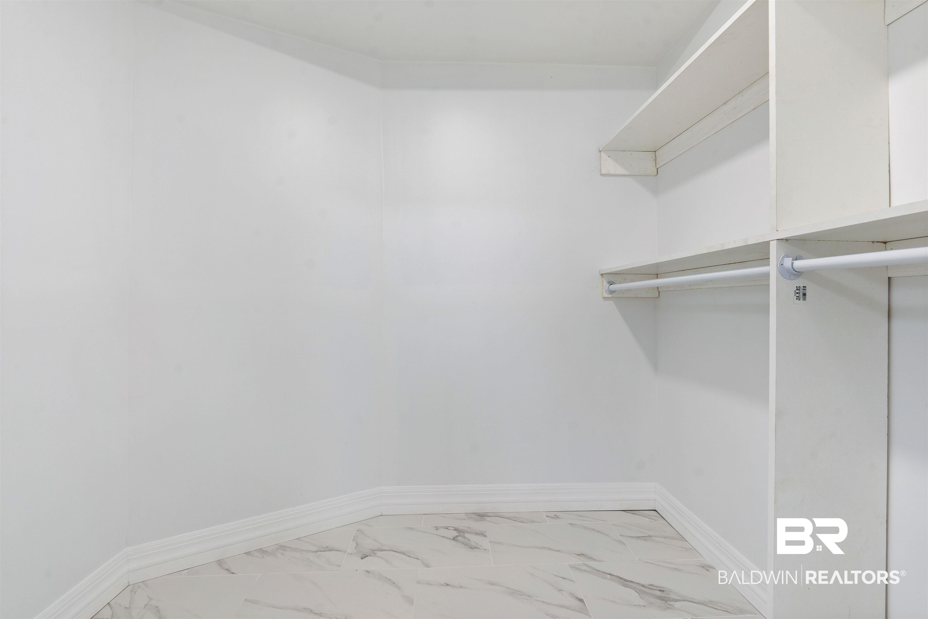 407 East 2nd Street Bay Minette, AL 36507 - Photo 21 of 40 Walk in closet with light marble finish flooring