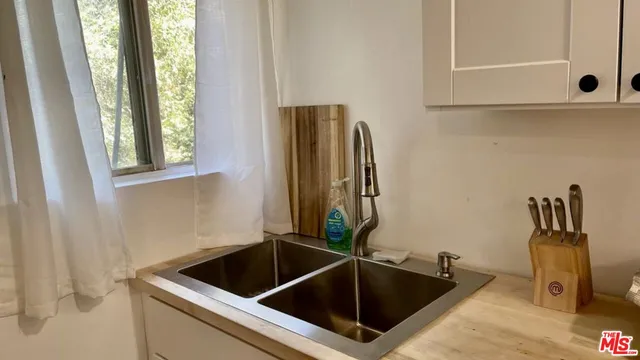 a bathroom with a sink and a bathtub