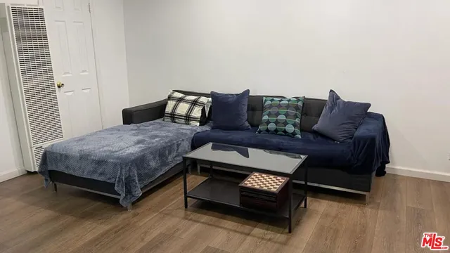 a bed room with a bed and a couch