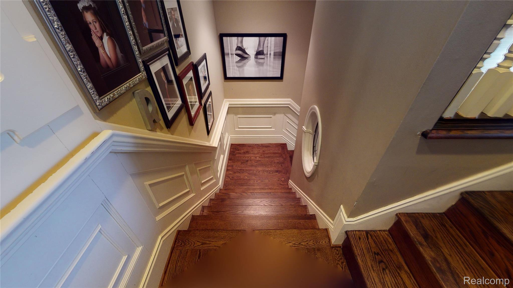 1472 Highpoint Court Rochester, MI 48306 - Photo 29 of 44 1472-Highpoint-Court-1472-staircase-basement-to-1st-floor-2.jpg