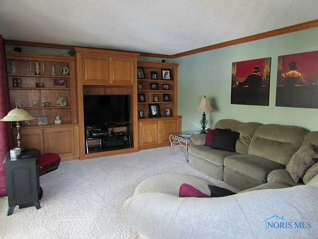 462 Eagle Point Road Rossford, OH 43460 - Photo 5 of 19 Family Room. Large bright family room offers entertainment center with great storage
