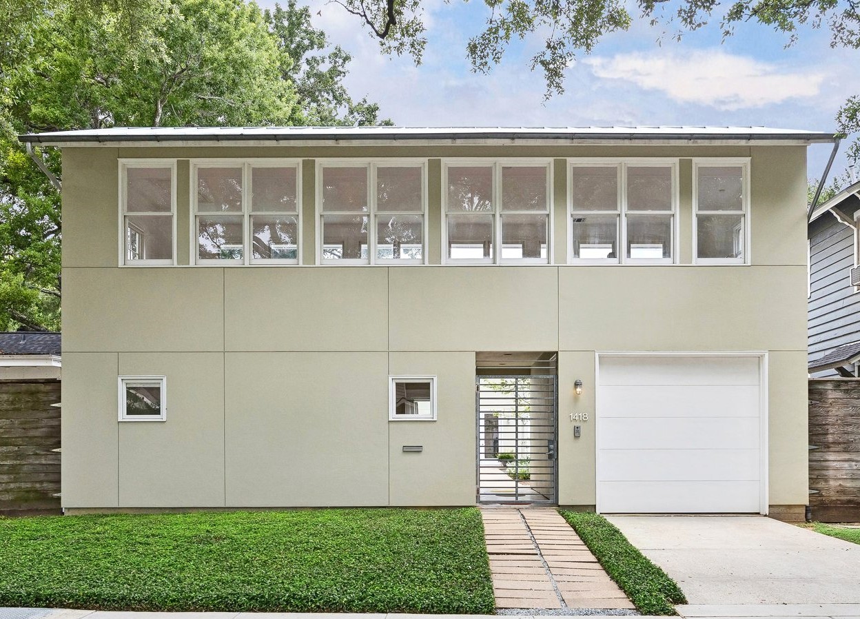 1418 Kipling Street Houston, TX 77006 - Photo 2 of 42 Another view of the front facade showing the entrance gate and breezeway between the garage and the home. Don't let this unassuming exterior fool you.
