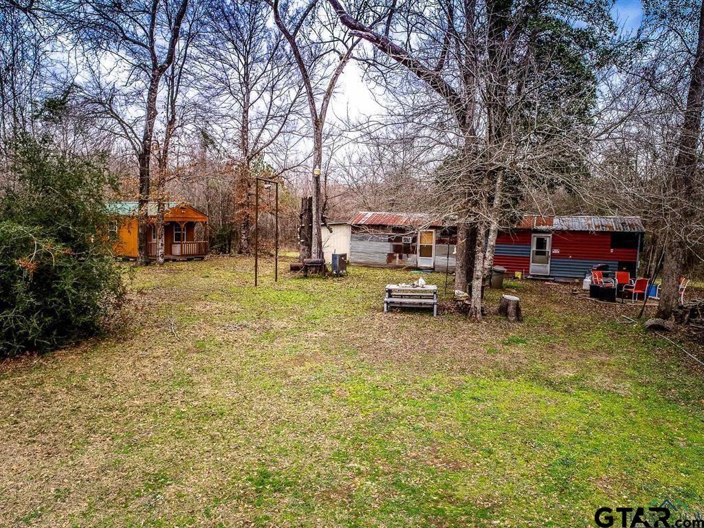 1322 Reklaw Tx 75784 Rusk, TX 75785 - Photo 19 of 22 a view of a yard with cars