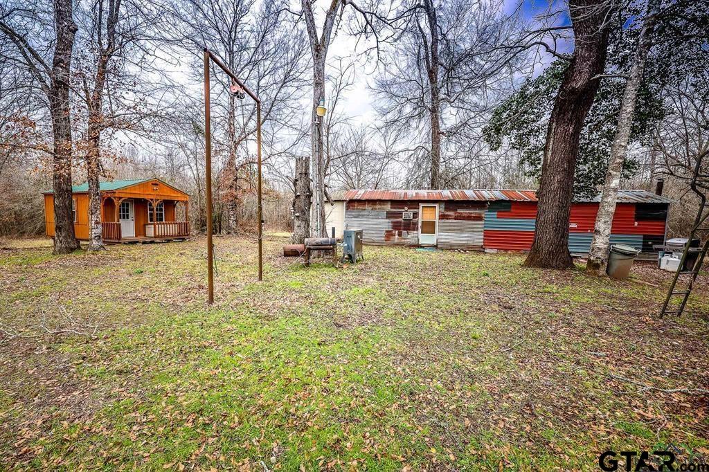 1322 Reklaw Tx 75784 Rusk, TX 75785 - Photo 21 of 22 a view of a house with a yard porch and sitting area