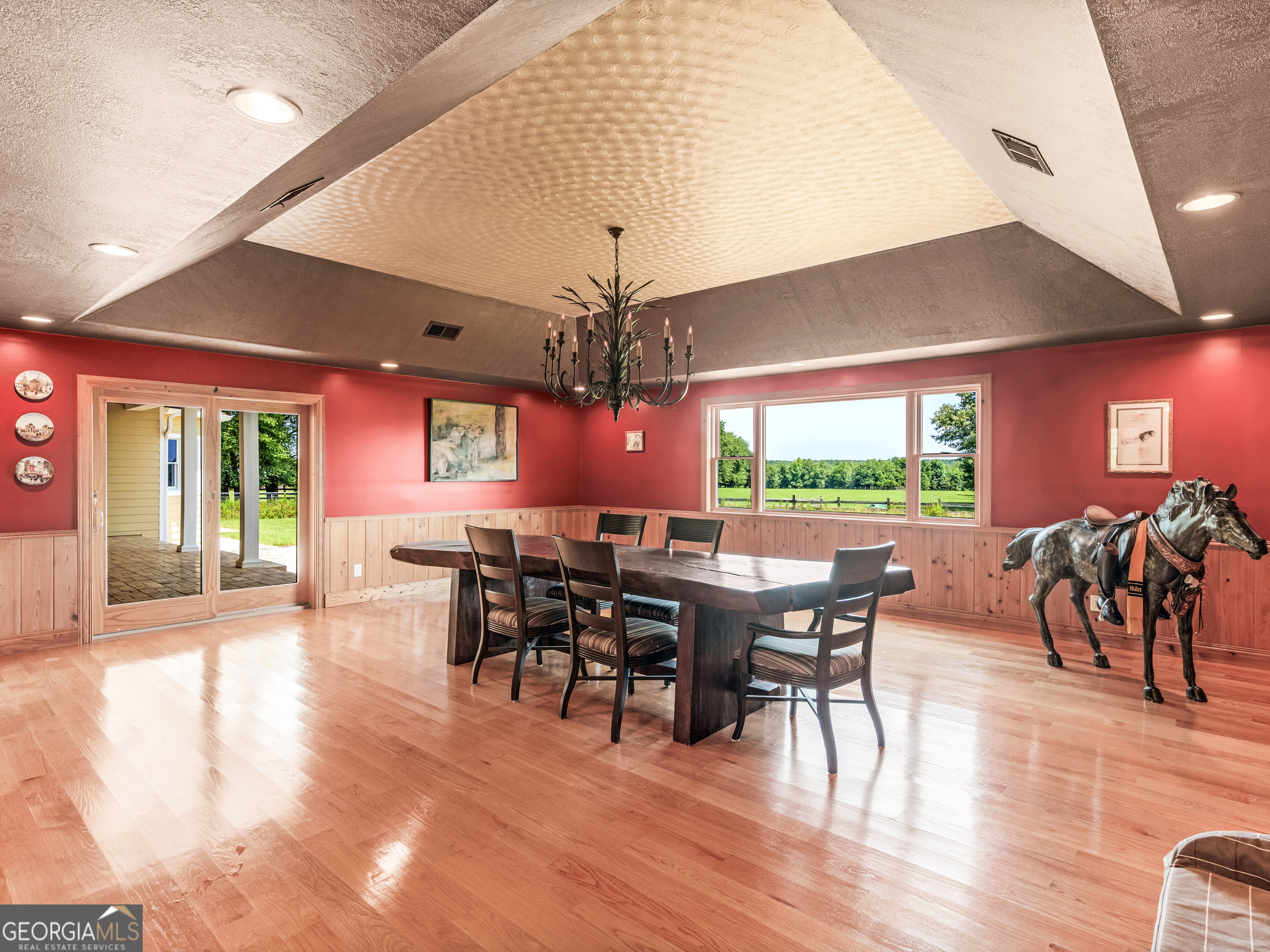 2051 Gough Road Louisville, GA 30434 - Photo 20 of 95 a view of a dining room with furniture window and wooden floor