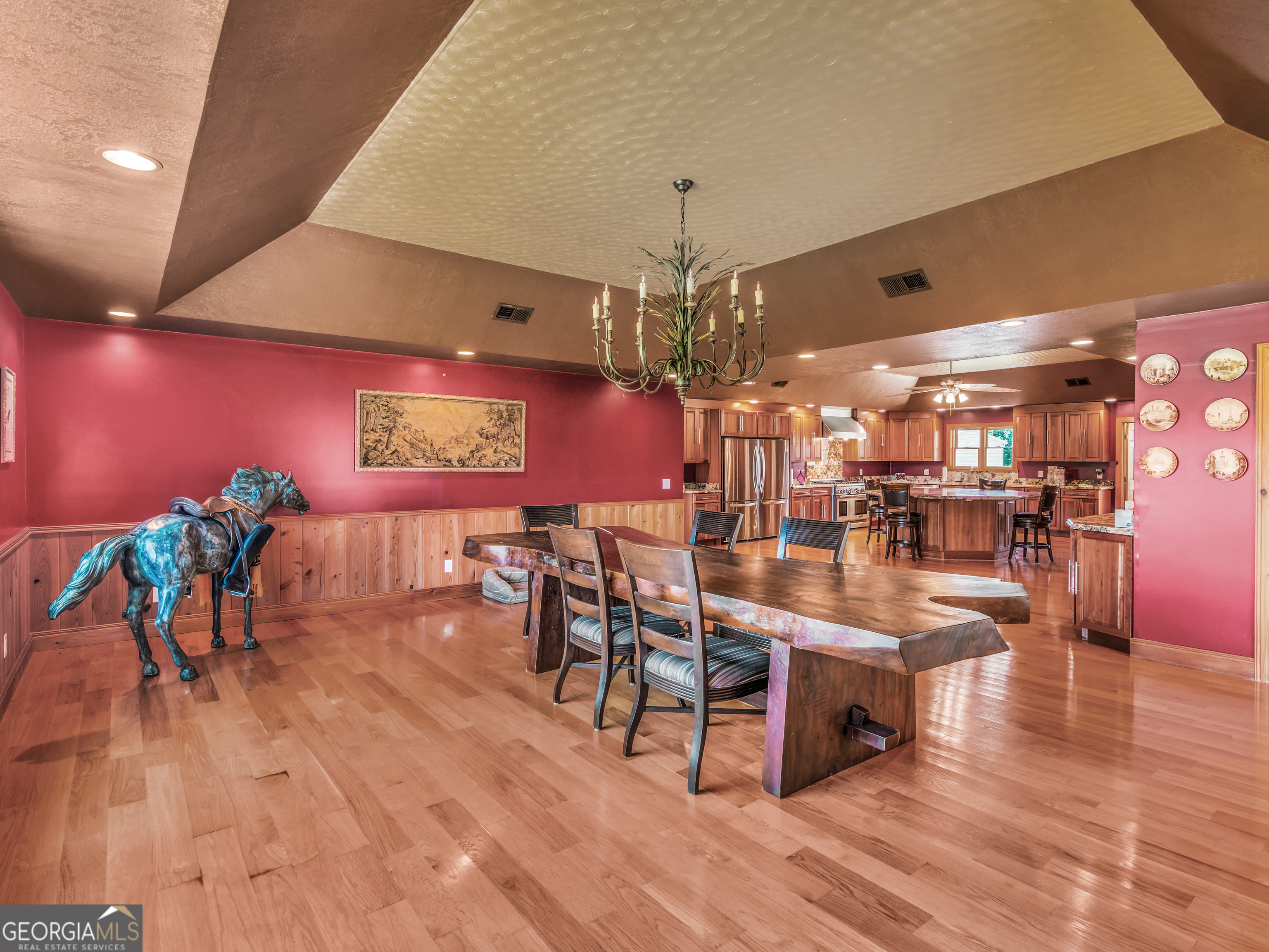 2051 Gough Road Louisville, GA 30434 - Photo 22 of 95 a view of a dining room with furniture and wooden floor